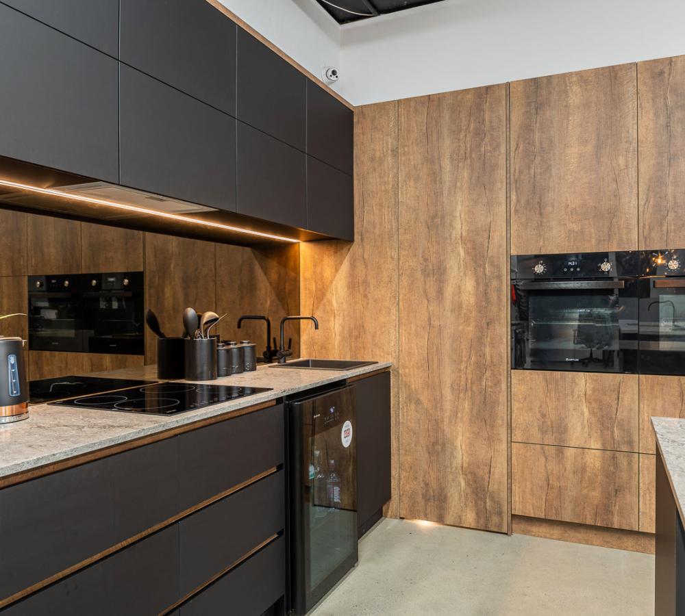 matt black and wood grain cabinetry